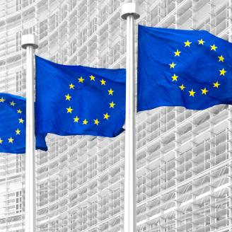 EU flags in front of European Commission in Brussels