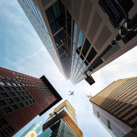 Frankfurt am Main Skyscraper low angle looking up to a plane in the sky